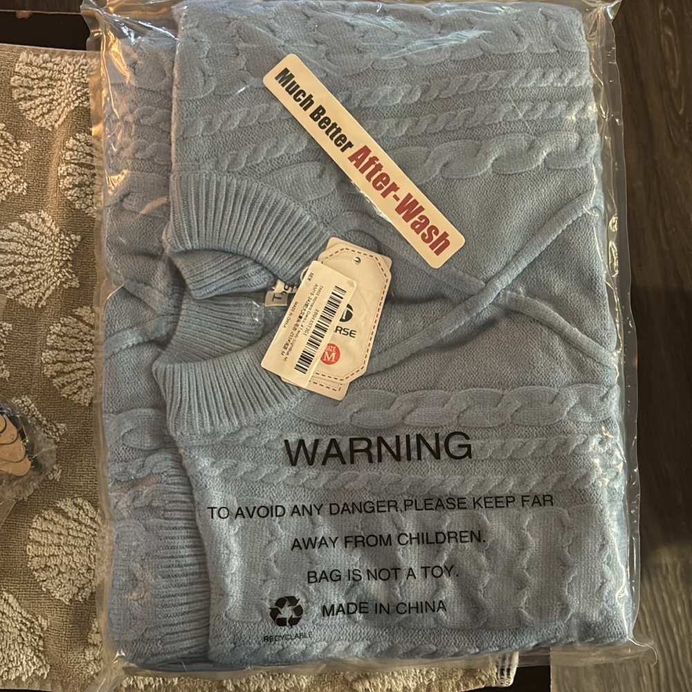 Tarse oversized knit sweater powder blue size medium (NWT)